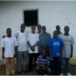 Rev. K. Zubah Kollie, Jr. with the Vezala Church men during his visit there